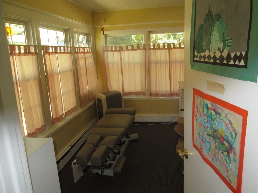113 Belcher Road Farmington, ME 04938 - Photo 6 of 14 Glassed-in porch/office.