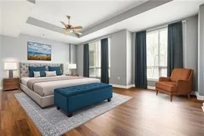 a bedroom with a bed and a couch