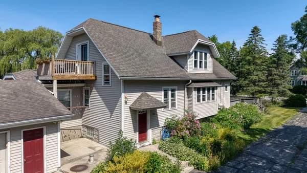 $450,000 | 2029-2031 West Donges Bay Road, Mequon, WI 53092