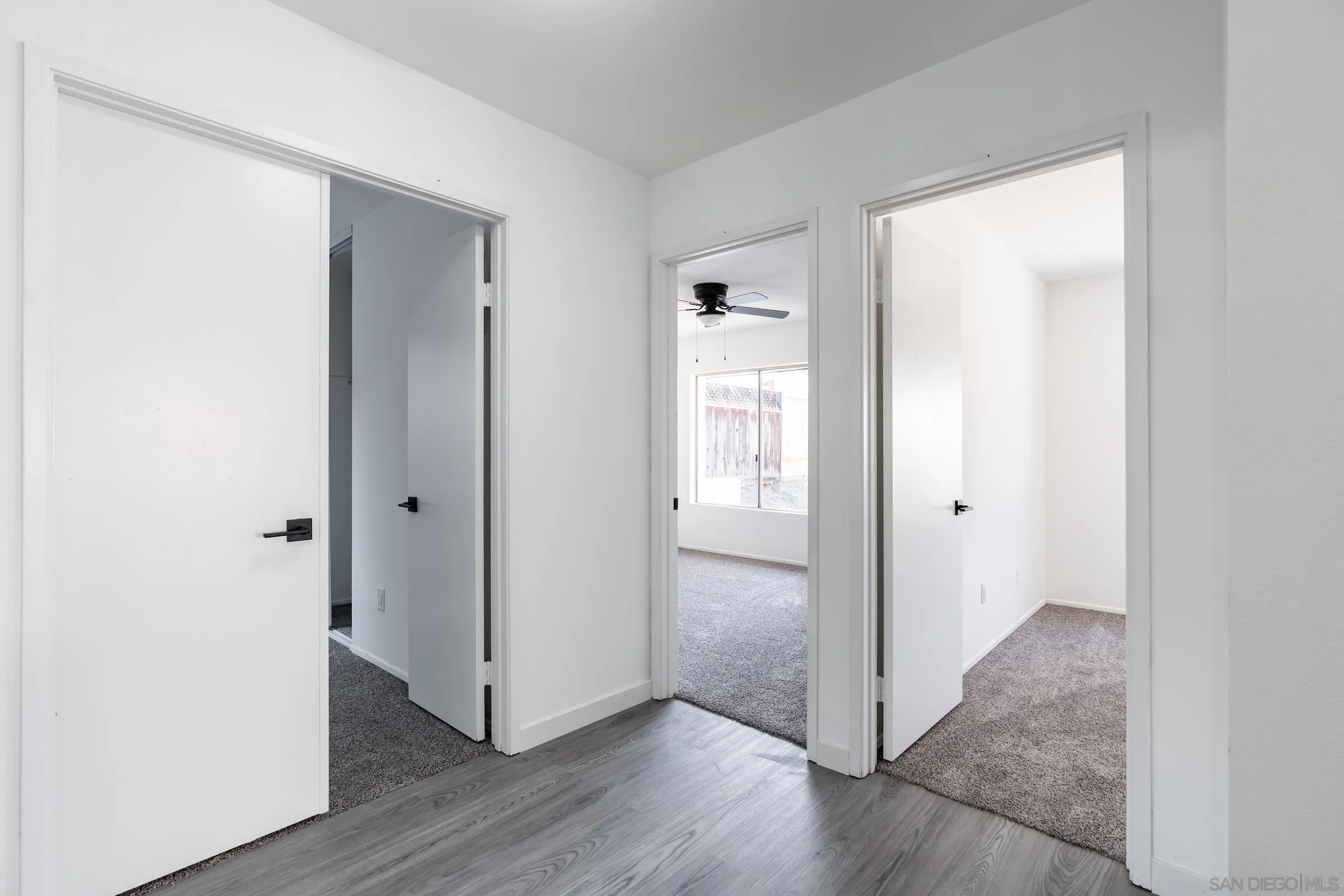 418 Kurdson Way Spring Valley, CA 91977 - Photo 17 of 25 a view of a hallway with wooden floor