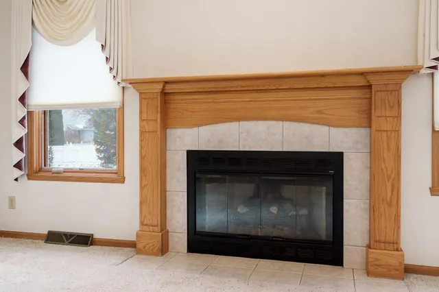 a view of a room with ceiling fan