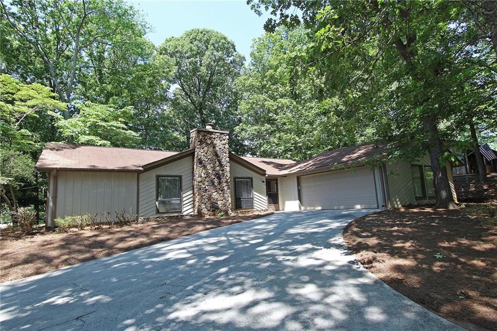 1275 Lake Lucerne Road Southwest Lilburn, GA 30047 - Photo 1 of 1 Large corner lot in the Camp Creek/Parkview school district!