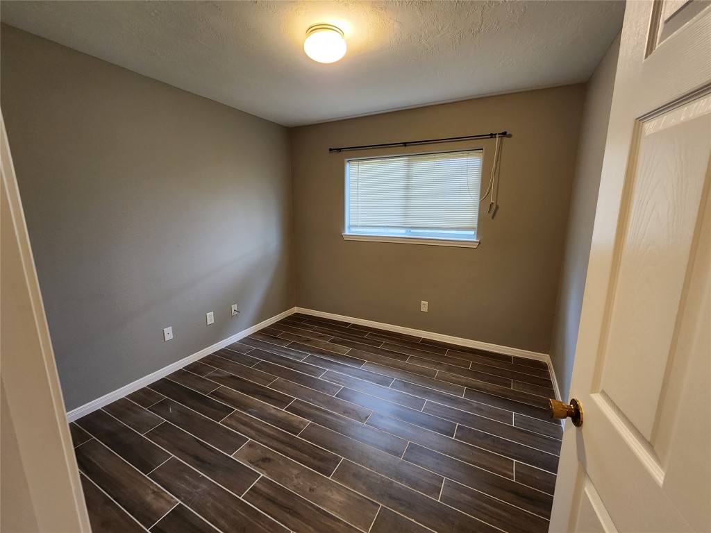 23107 Kimberly Glen Lane Spring, TX 77373 - Photo 6 of 8 a view of an empty room