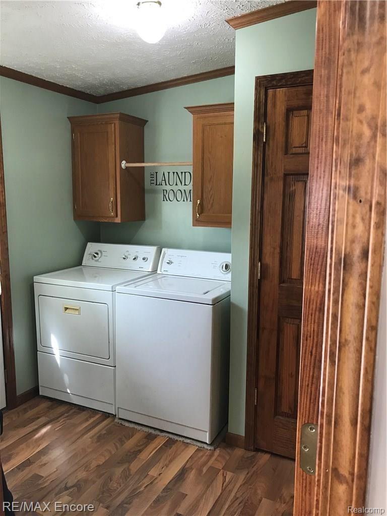 14218 Stuart Road Chesaning, MI 48616 - Photo 15 of 44 BACK ENTRY THRU LAUNDRY/ MUD ROOM