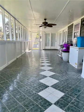 a view of park with a wooden fence