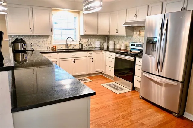 a front view of house with yard