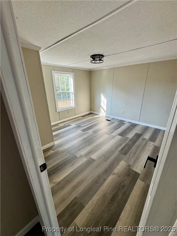 110 Flynn McPherson Road Cameron, NC 28326 - Photo 11 of 19 a view of empty room with wooden floor