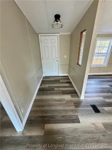 a view of an empty room and window