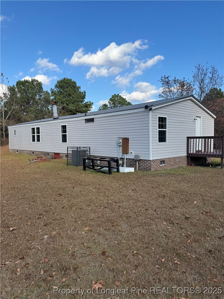 110 Flynn McPherson Road Cameron, NC 28326 - Photo 18 of 19 a view of a house with backyard