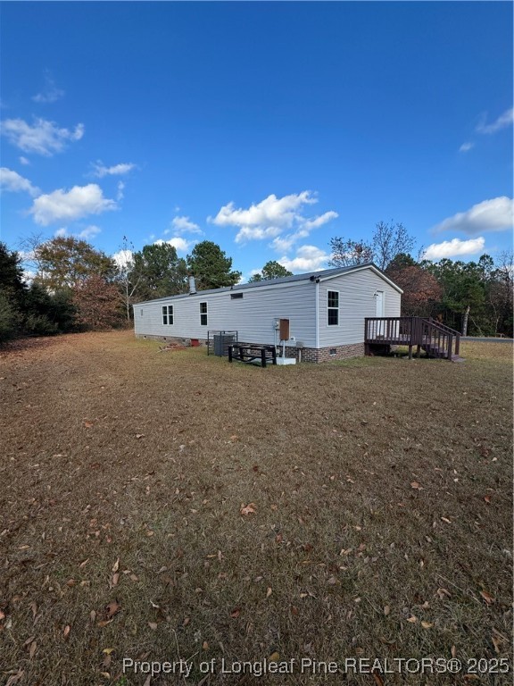 110 Flynn McPherson Road Cameron, NC 28326 - Photo 2 of 19 a view of a house with a big yard