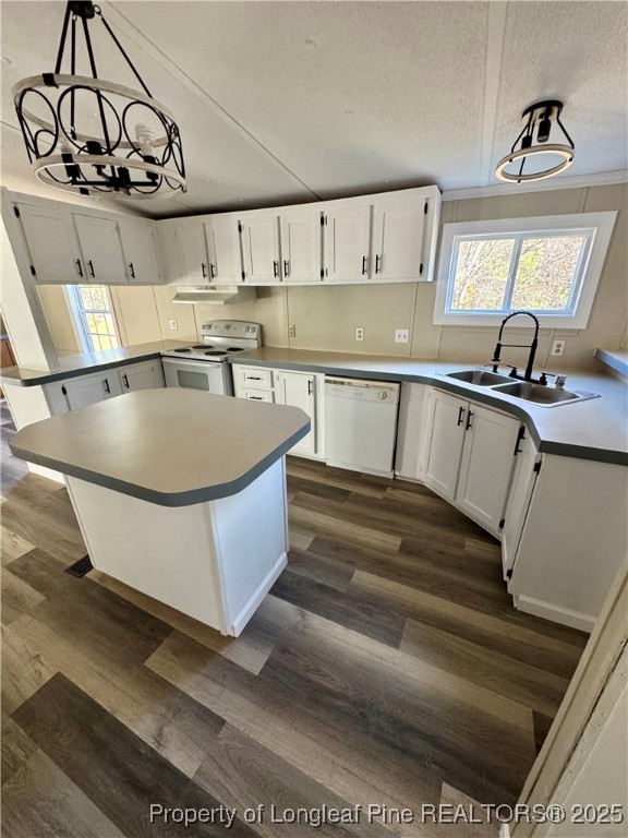 110 Flynn McPherson Road Cameron, NC 28326 - Photo 3 of 19 a kitchen with stainless steel appliances granite countertop a sink and cabinets