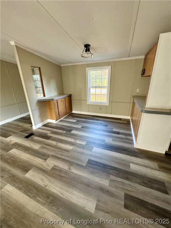 110 Flynn McPherson Road Cameron, NC 28326 - Photo 5 of 19 a view of an empty room with wooden floor and a window