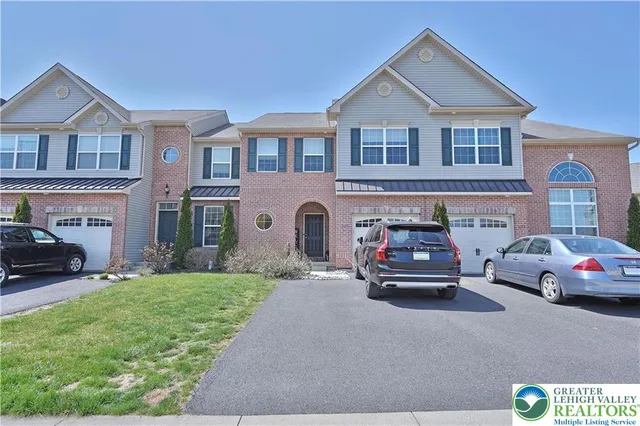 a car parked in front of a house