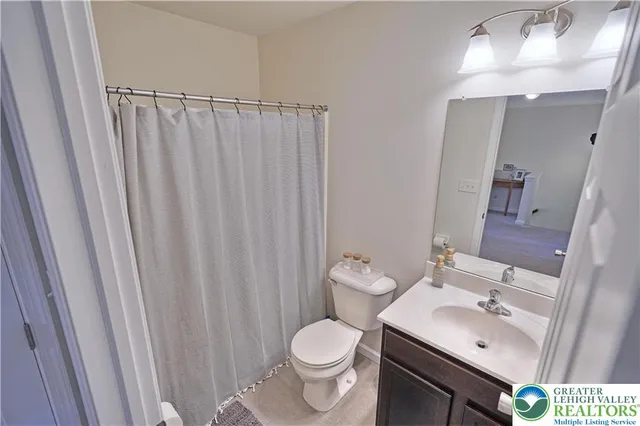 a bathroom with a sink and a toilet