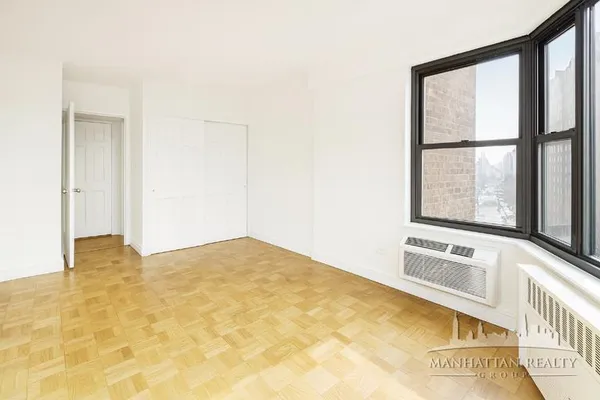 a view of an empty room with window