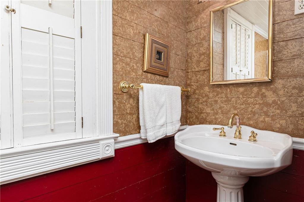 176 Confederate Avenue Dallas, GA 30132 - Photo 17 of 51 a bathroom with a sink and a mirror