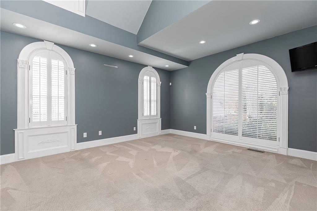 176 Confederate Avenue Dallas, GA 30132 - Photo 21 of 51 an empty room with windows and outdoor view