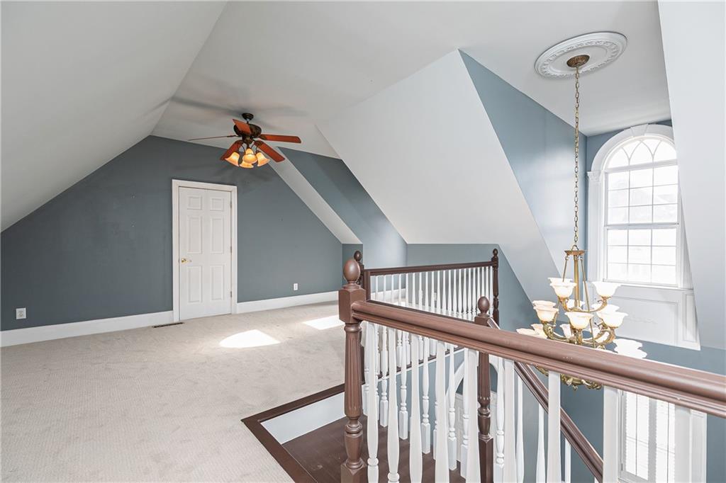 176 Confederate Avenue Dallas, GA 30132 - Photo 27 of 51 a view of a livingroom with wooden floor and stairs