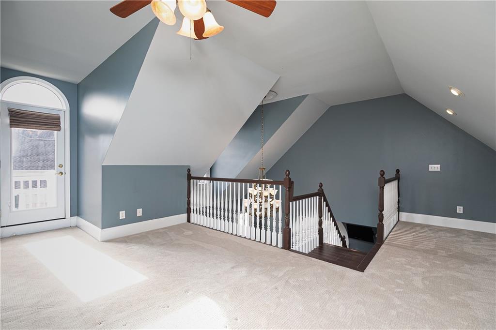 176 Confederate Avenue Dallas, GA 30132 - Photo 29 of 51 an empty room with windows and entrance