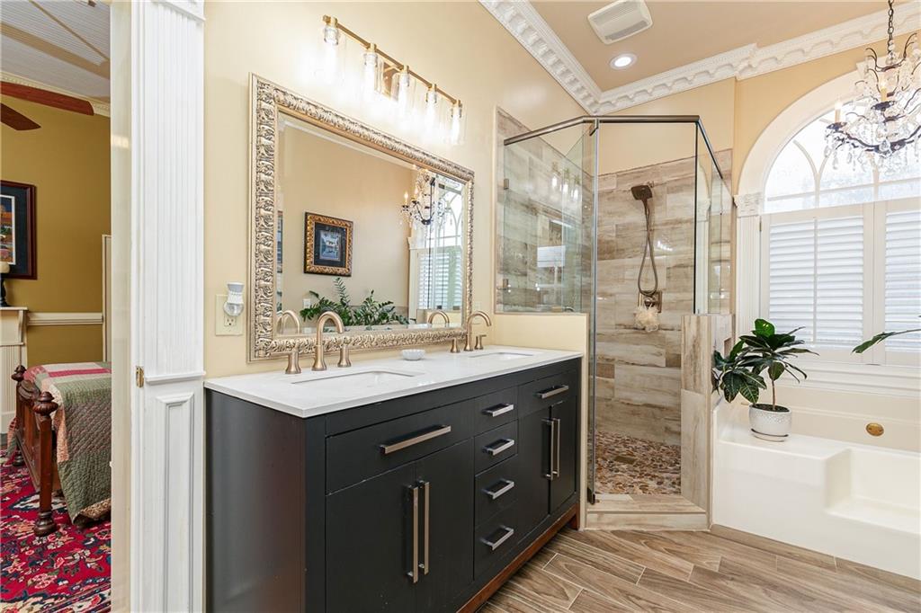 176 Confederate Avenue Dallas, GA 30132 - Photo 30 of 51 a bathroom with a granite countertop sink and a mirror