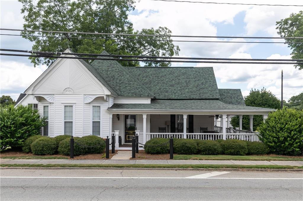 176 Confederate Avenue Dallas, GA 30132 - Photo 3 of 51 a view of house with car parked