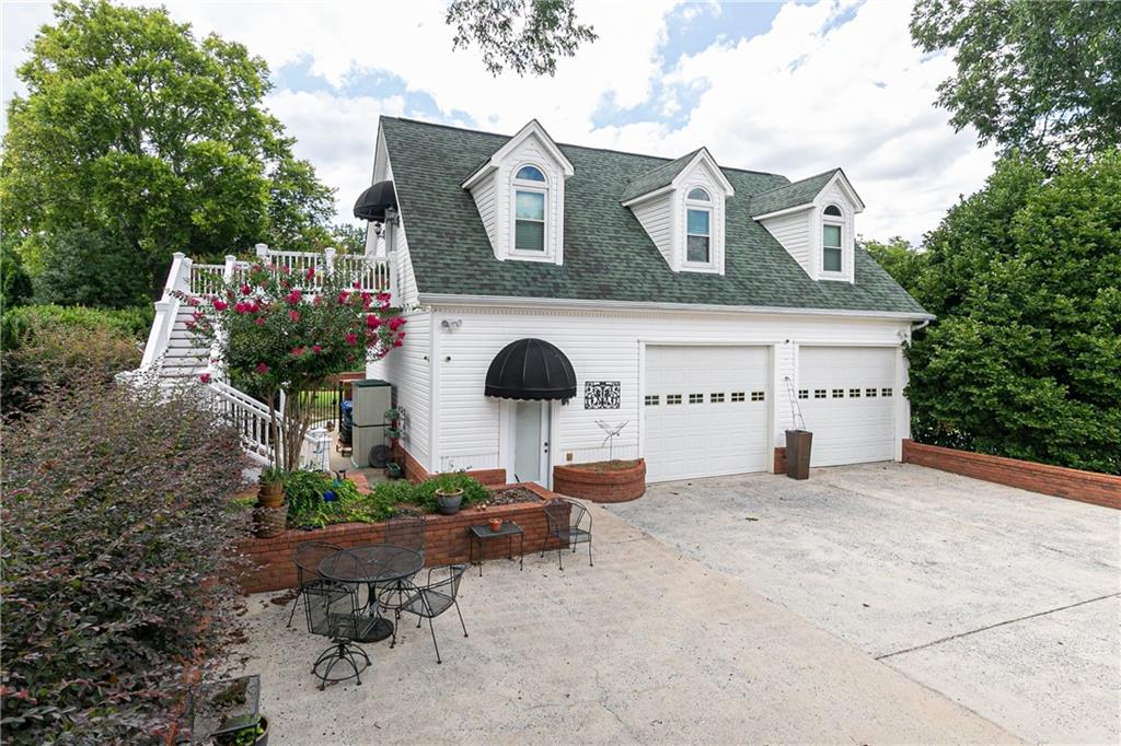 176 Confederate Avenue Dallas, GA 30132 - Photo 36 of 51 a front view of a house with garden