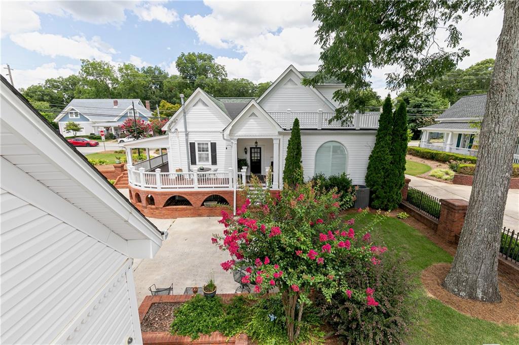 176 Confederate Avenue Dallas, GA 30132 - Photo 48 of 51 a view of a house with a yard and potted plants