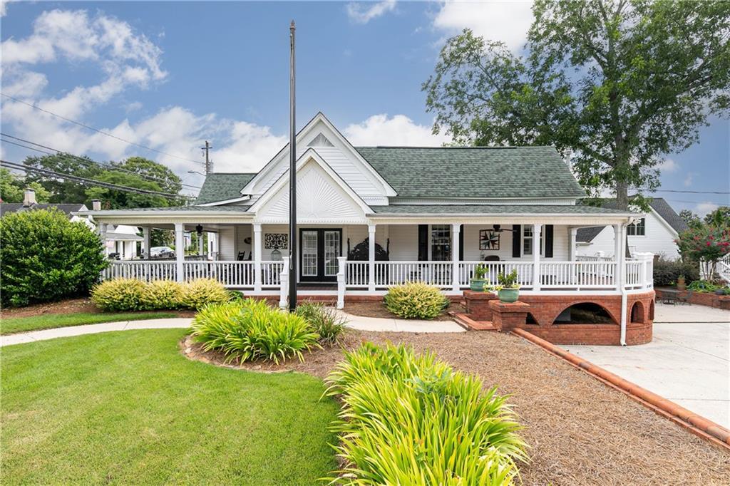 176 Confederate Avenue Dallas, GA 30132 - Photo 51 of 51 front view of a house with a yard
