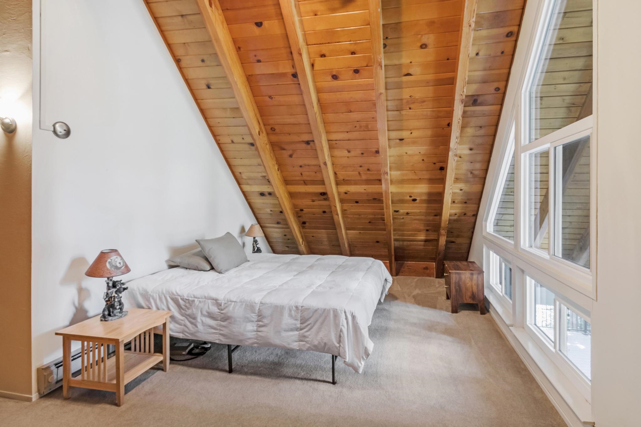 41158 Skyline Drive Emigrant Gap, CA 95715 - Photo 11 of 21 a bedroom with furniture and a window
