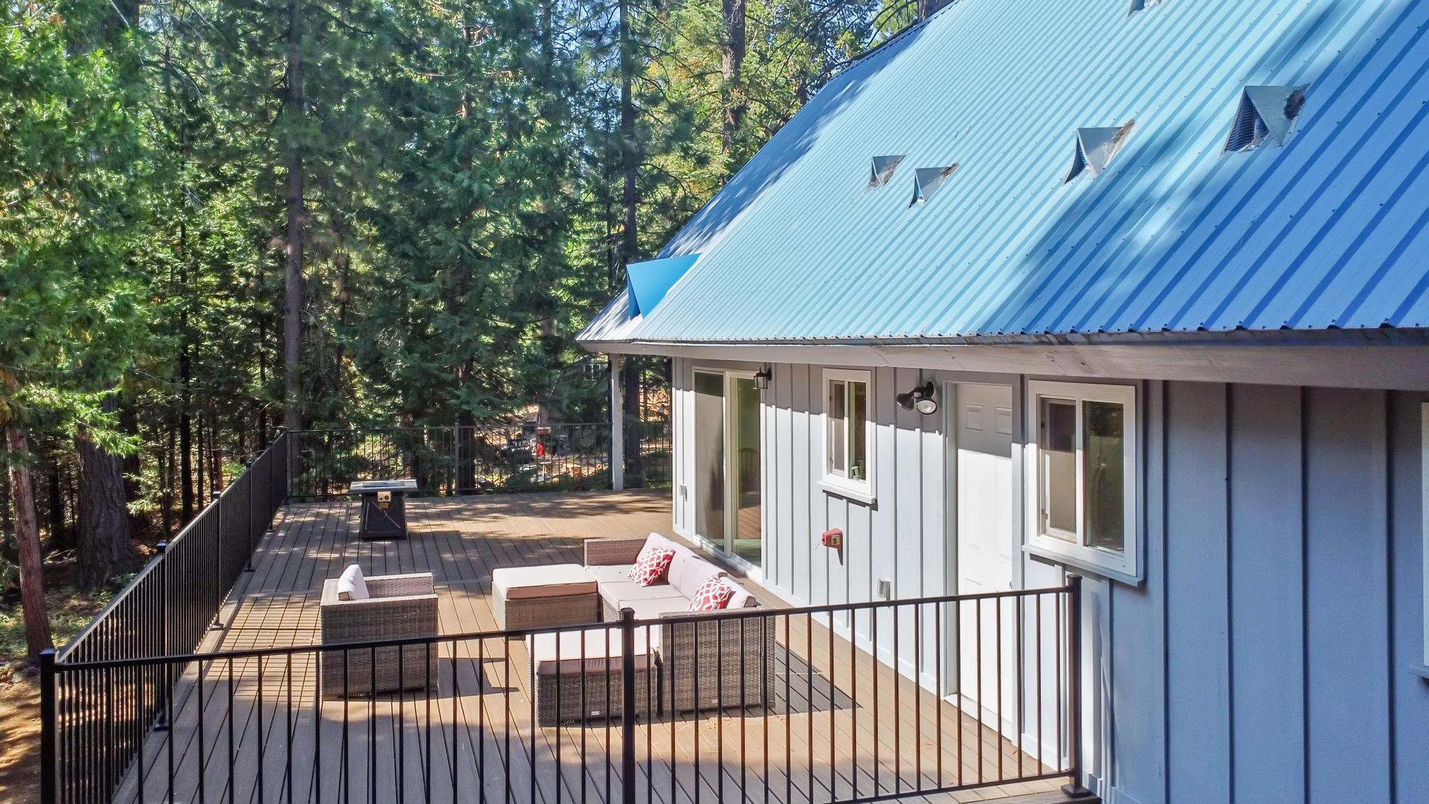 41158 Skyline Drive Emigrant Gap, CA 95715 - Photo 16 of 21 a view of a house with backyard and deck
