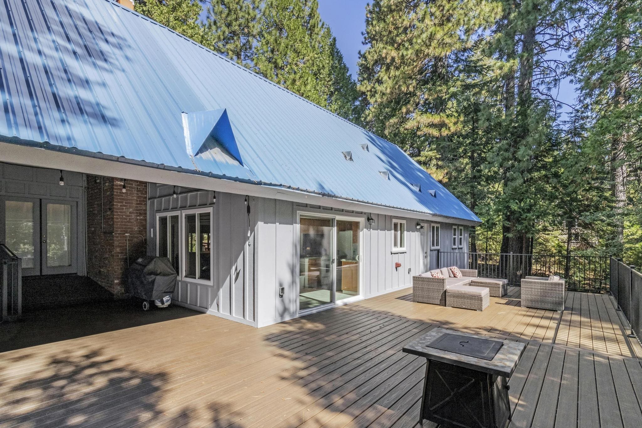 41158 Skyline Drive Emigrant Gap, CA 95715 - Photo 17 of 21 a view of a house with backyard and sitting area