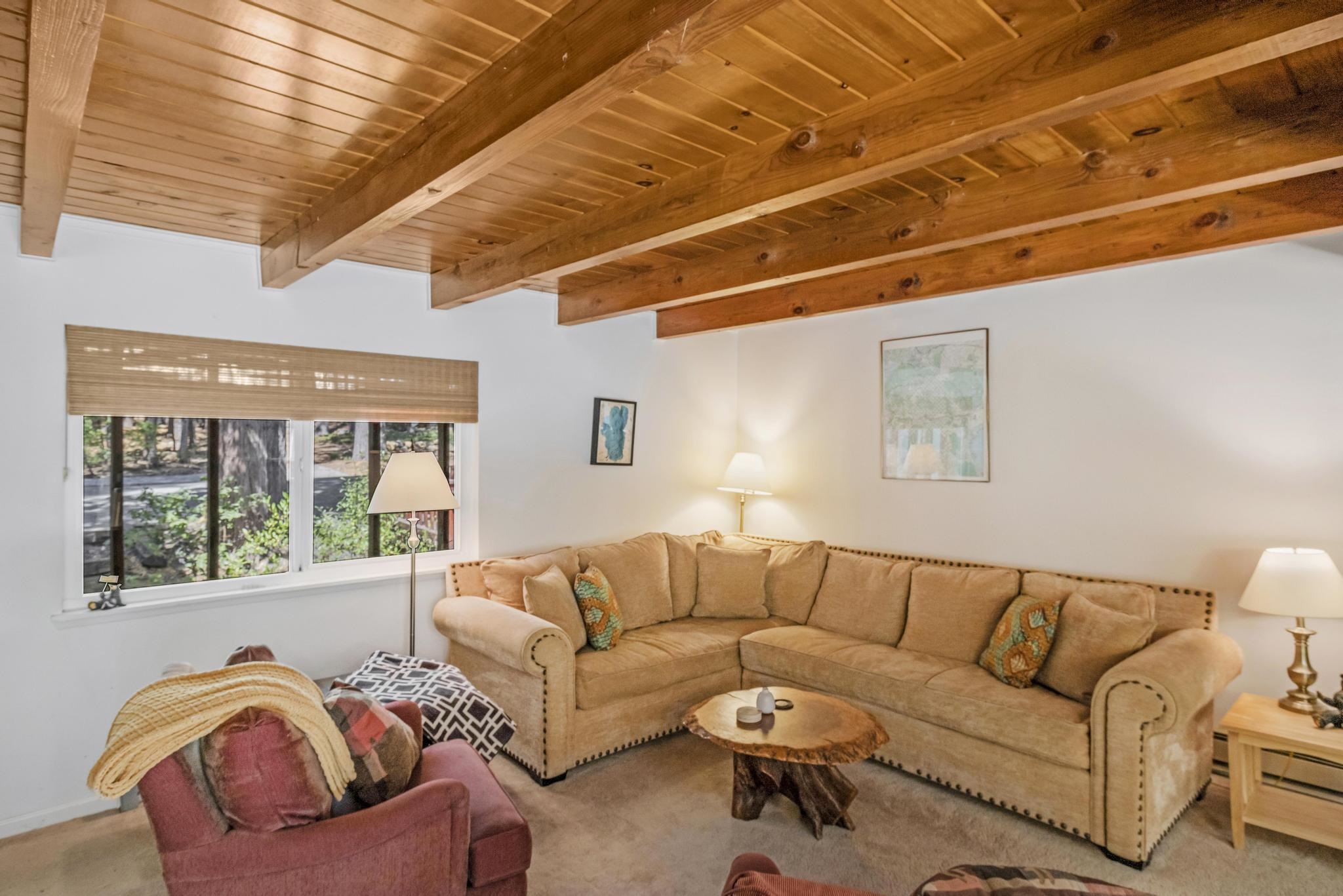 41158 Skyline Drive Emigrant Gap, CA 95715 - Photo 2 of 21 a living room with furniture and a large window