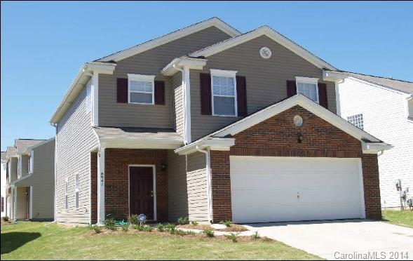 8941 Chalkstone Road Charlotte, NC 28216 - Photo 1 of 20 a view of a house with a yard