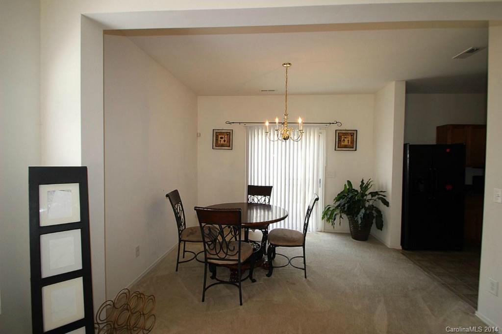 8941 Chalkstone Road Charlotte, NC 28216 - Photo 3 of 20 a view of a livingroom with furniture and window