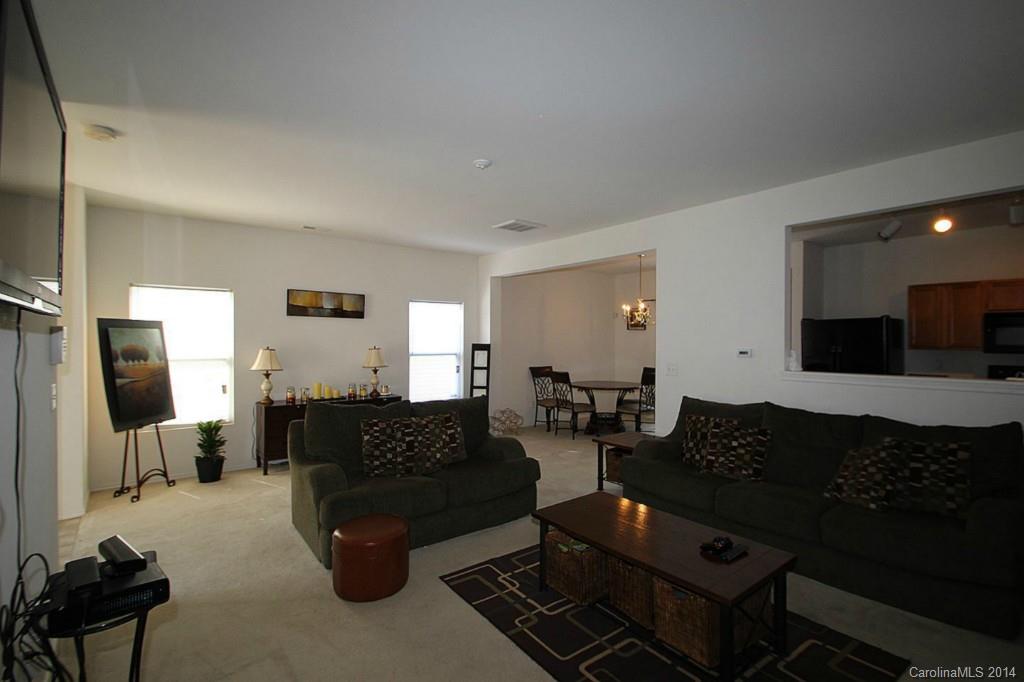 8941 Chalkstone Road Charlotte, NC 28216 - Photo 8 of 20 a living room with furniture