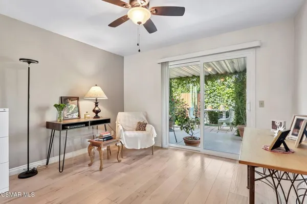 a living room with furniture and a window
