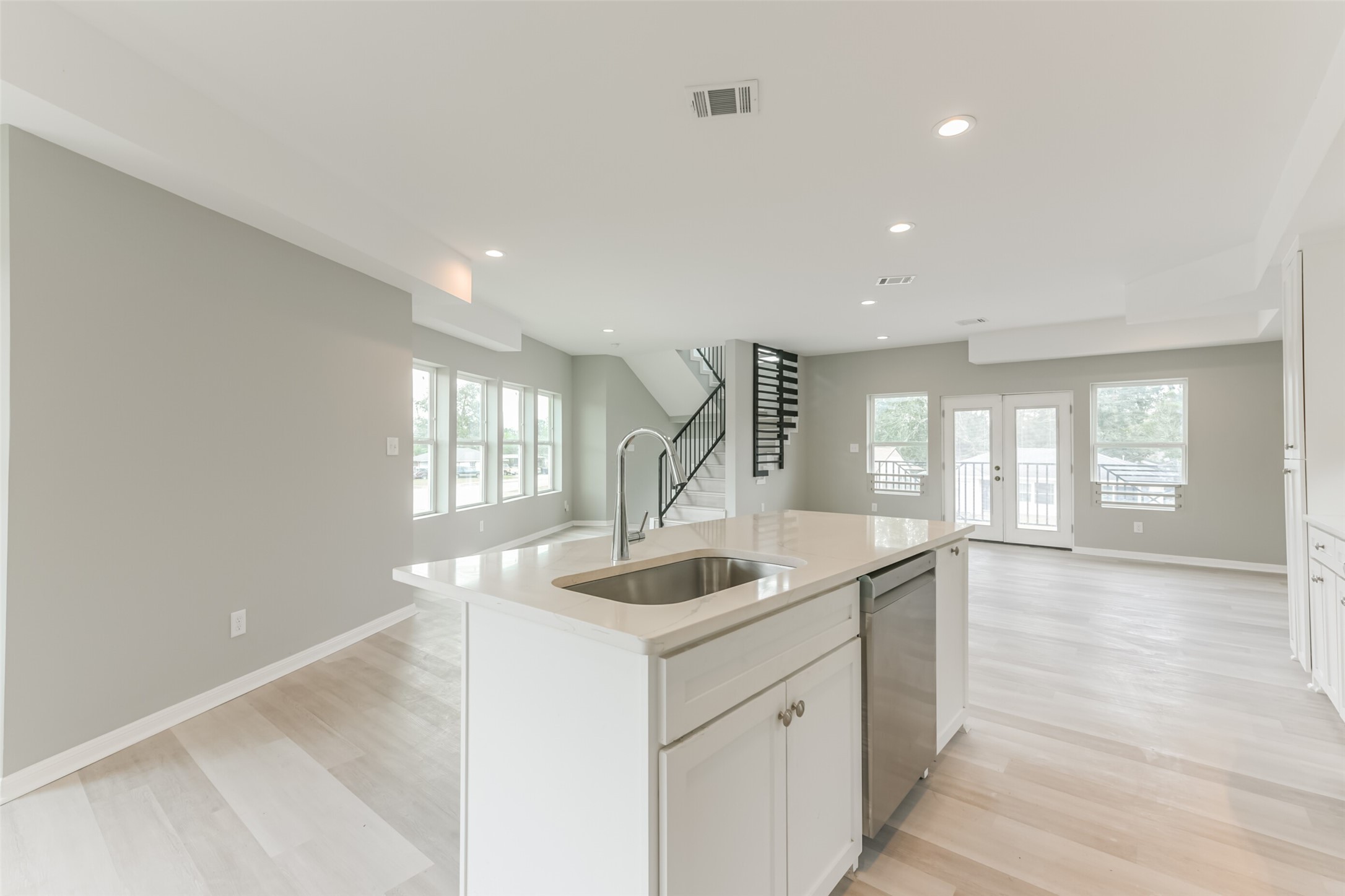 5302 Tarawa Road Houston, TX 77033 - Photo 15 of 35 a kitchen with sink and center island