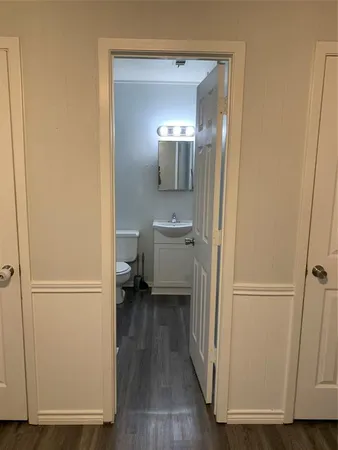 a bathroom with a bath tub with a shower