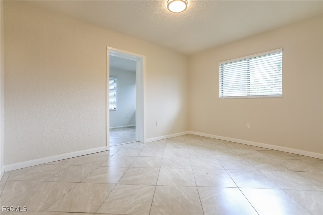 4024 Gingold Street Port Charlotte, FL 33948 - Photo 12 of 16 an empty room with a bathroom
