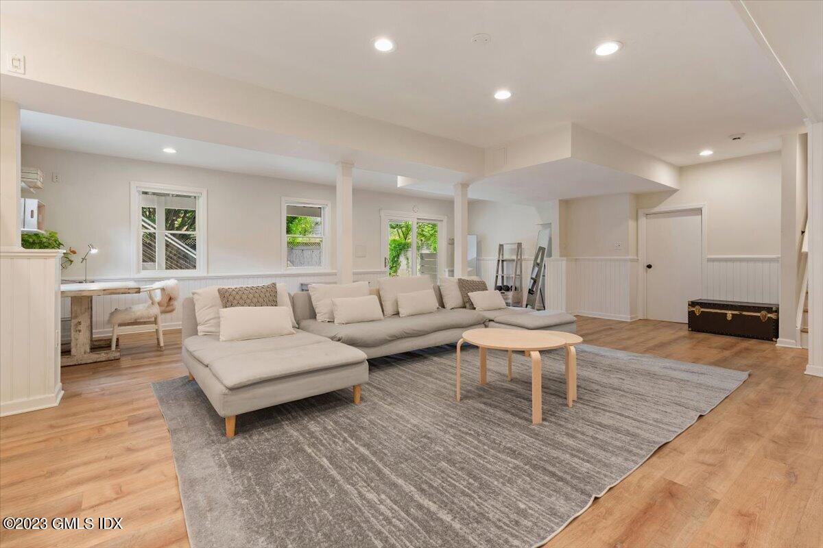 5 Sunshine Avenue Riverside, CT 06878 - Photo 26 of 35 a living room with furniture and a wooden floor
