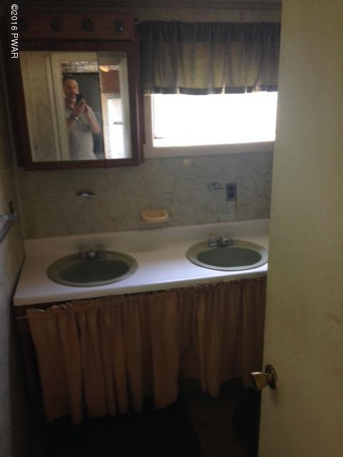 Rear Wesser Road Moscow, PA 18444 - Photo 8 of 10 a bathroom with a sink and a window