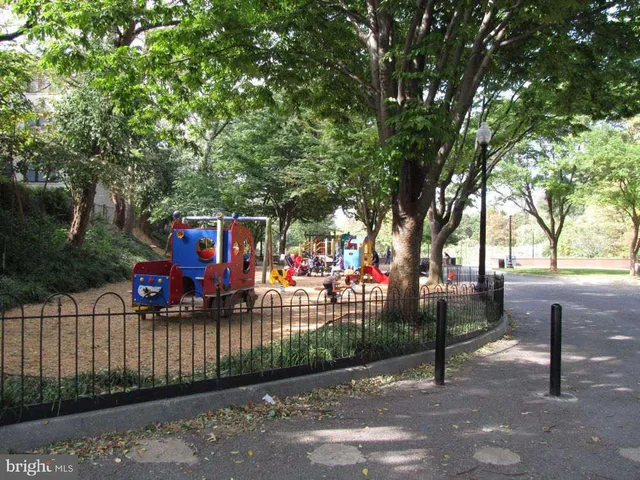 a view of street with sitting area