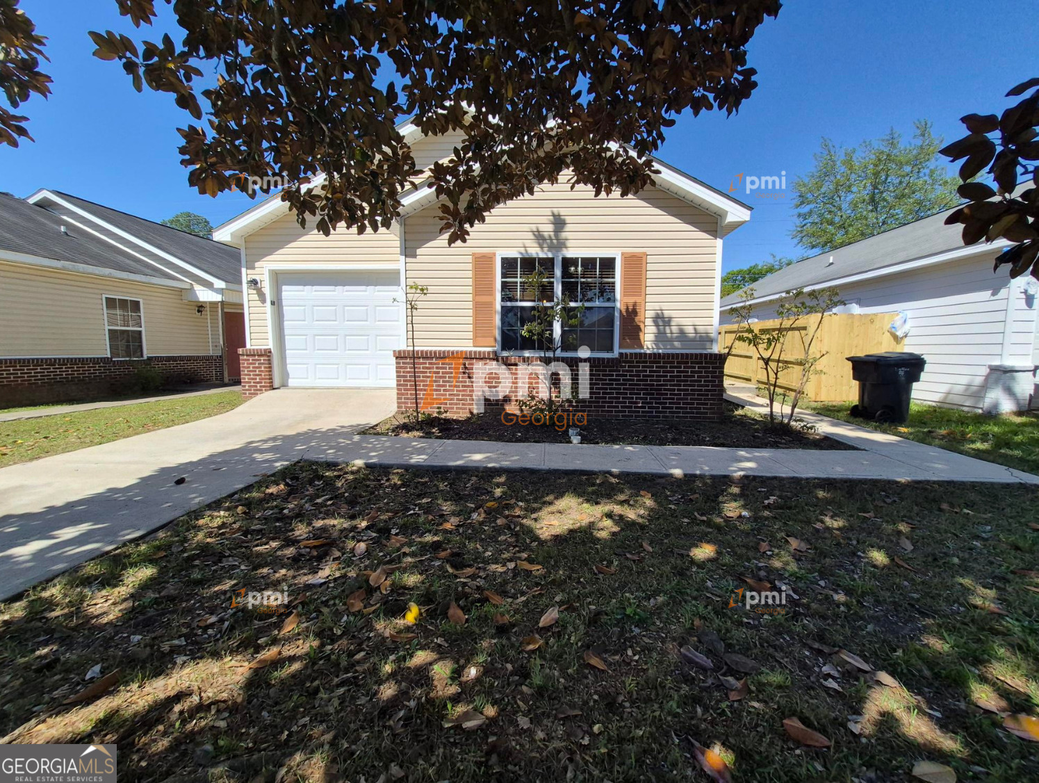 342 Orchard Way Warner Robins, GA 31088 - Photo 1 of 15 a front view of a house with a yard