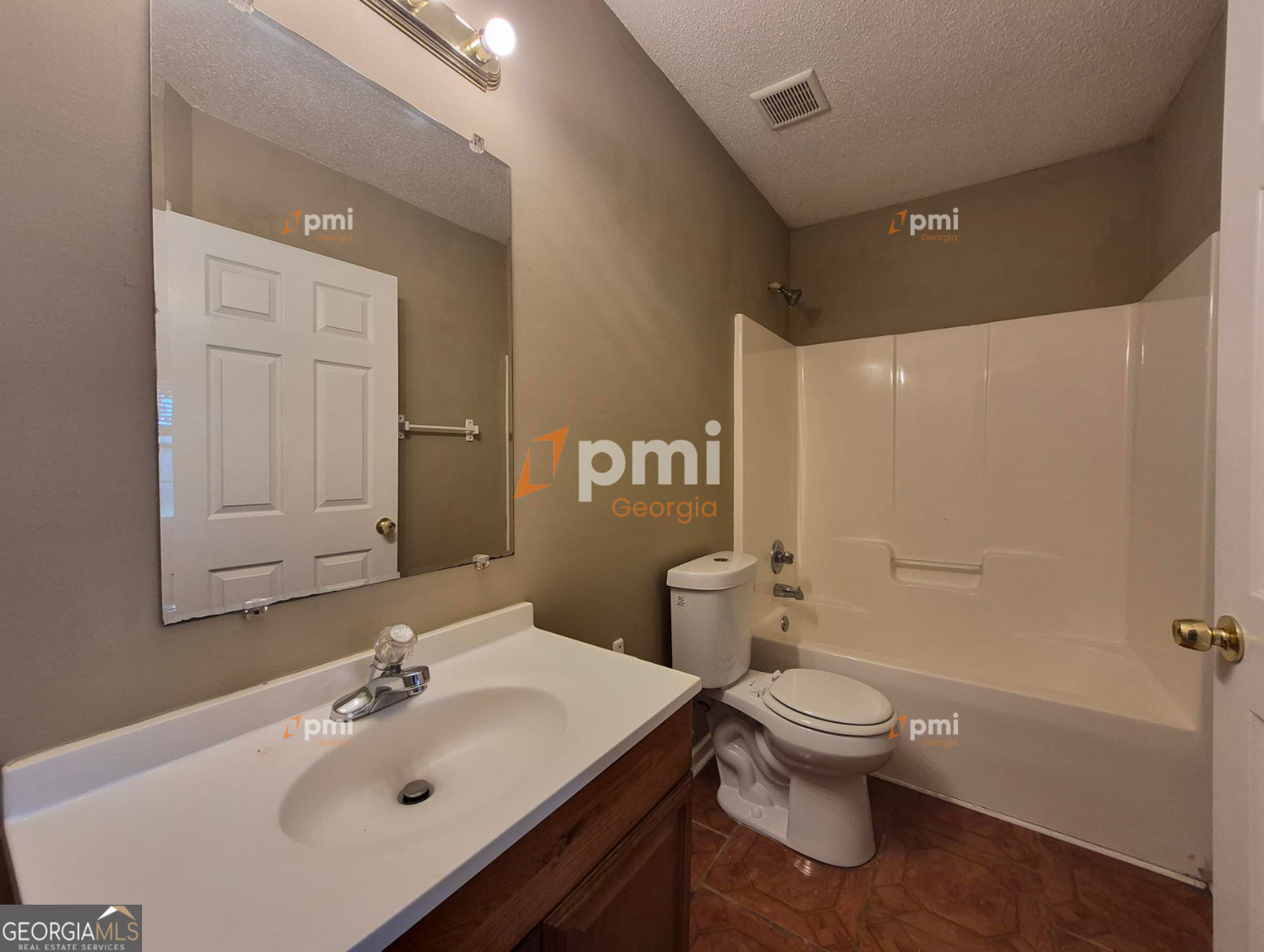 342 Orchard Way Warner Robins, GA 31088 - Photo 13 of 15 a bathroom with a sink toilet and shower