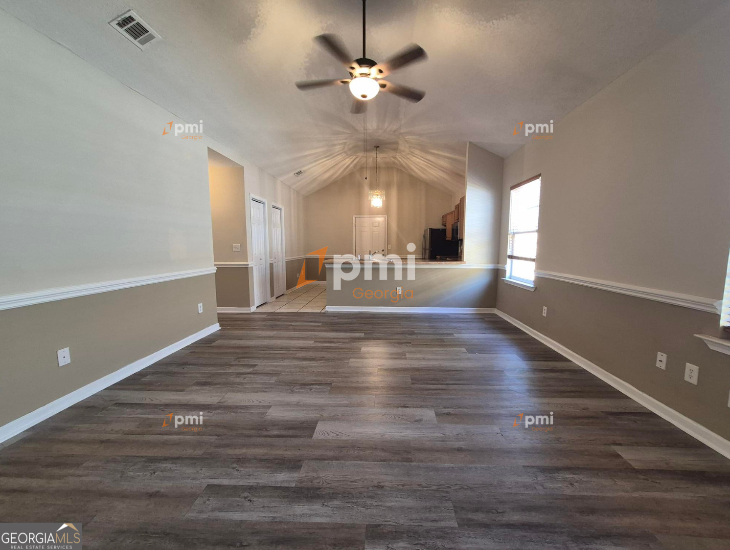 342 Orchard Way Warner Robins, GA 31088 - Photo 5 of 15 a view of an empty room with a window
