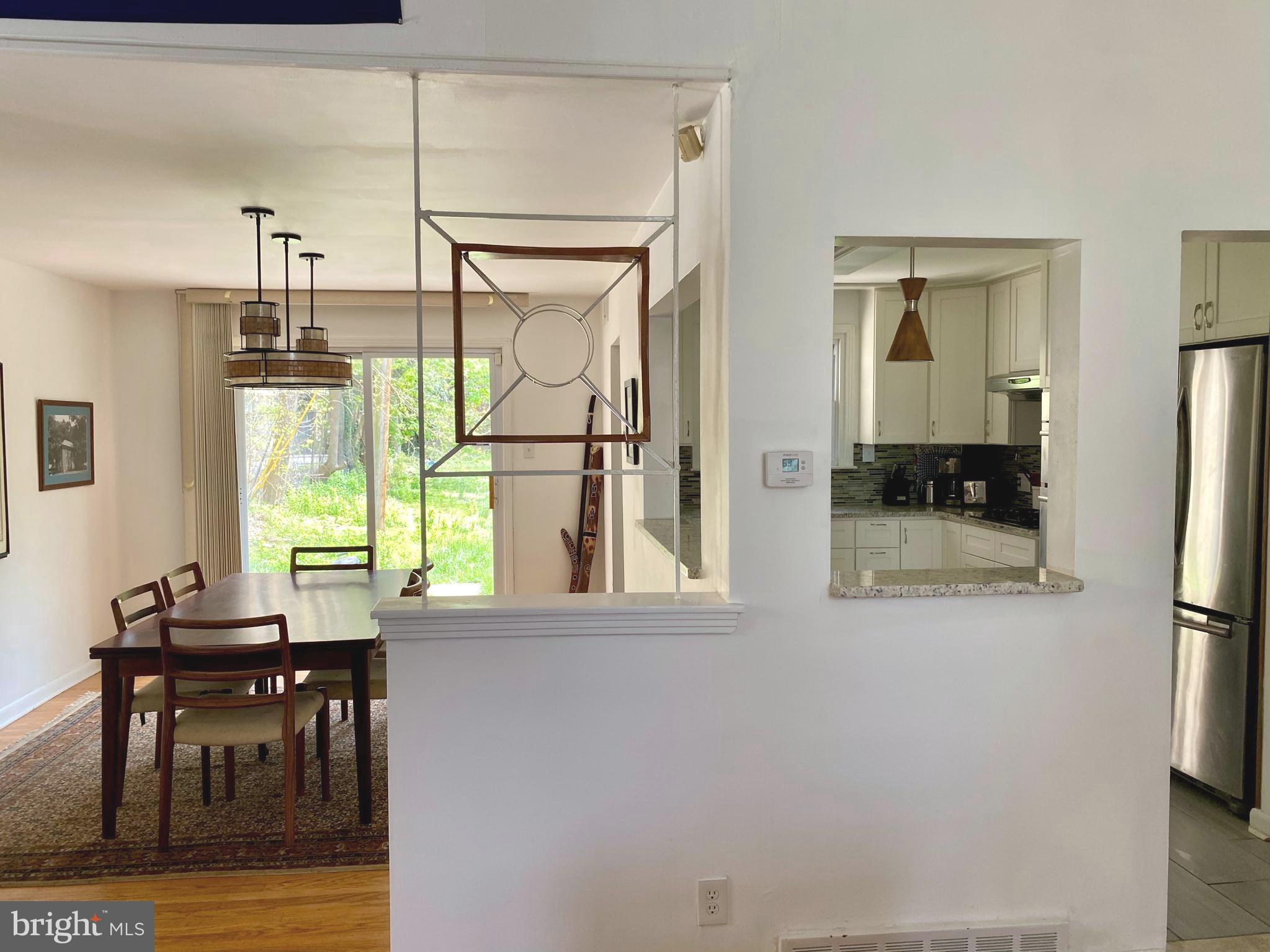 512 Roumfort Road Philadelphia, PA 19119 - Photo 22 of 43 View from living room into dining room and kitchen