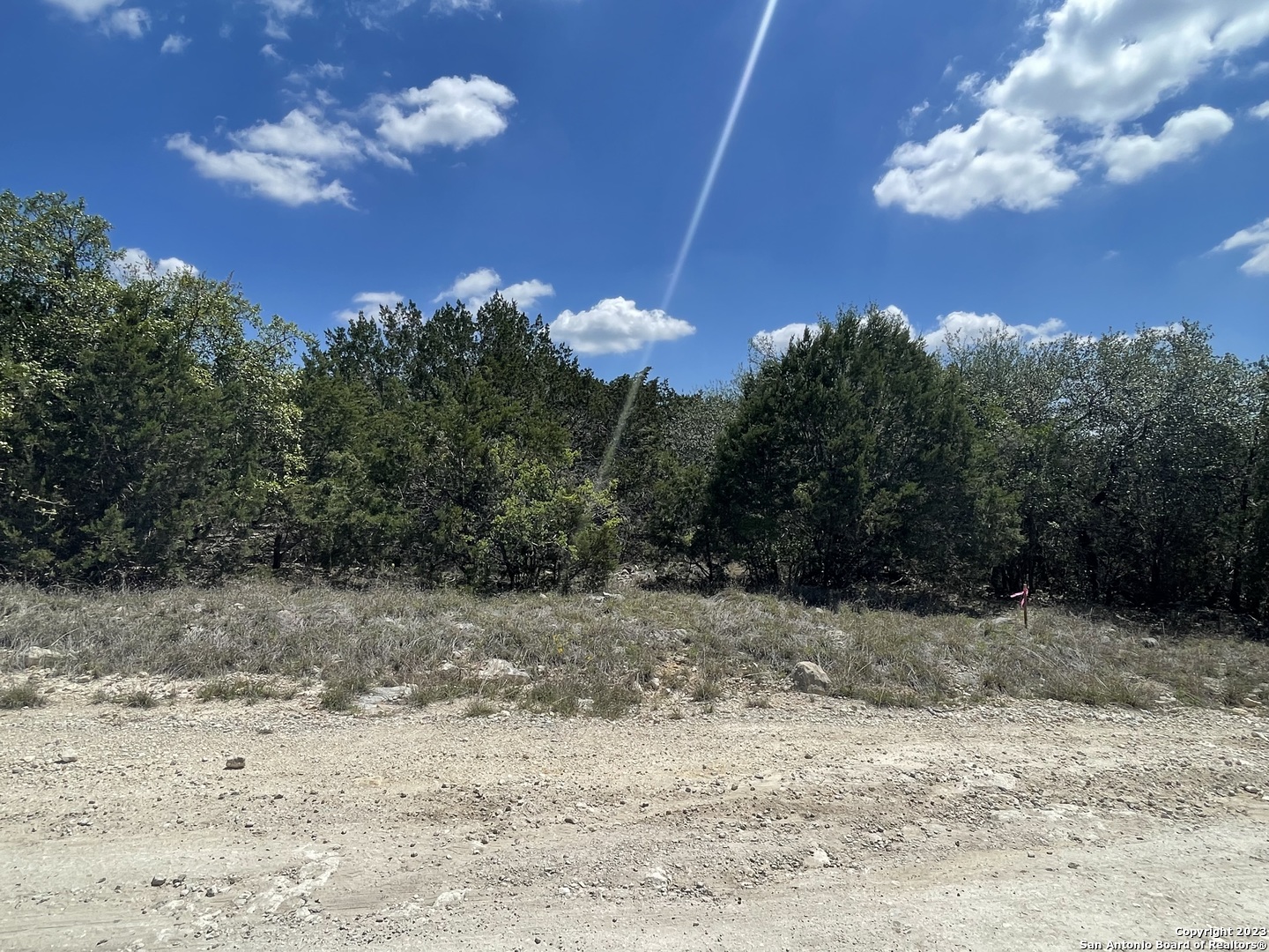 Lot 6 Campfire Spring Branch, TX 78070 - Photo 11 of 11 a view of a yard with a tree