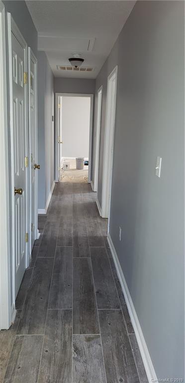 9610 Rau Court Charlotte, NC 28215 - Photo 9 of 10 a view of a hallway