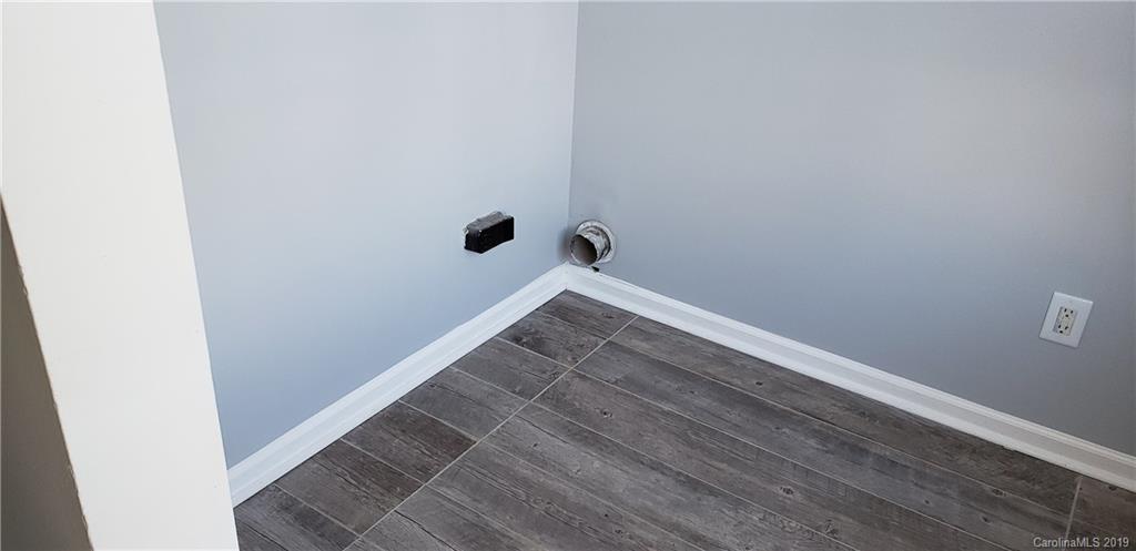 9610 Rau Court Charlotte, NC 28215 - Photo 10 of 10 a view of wooden floor