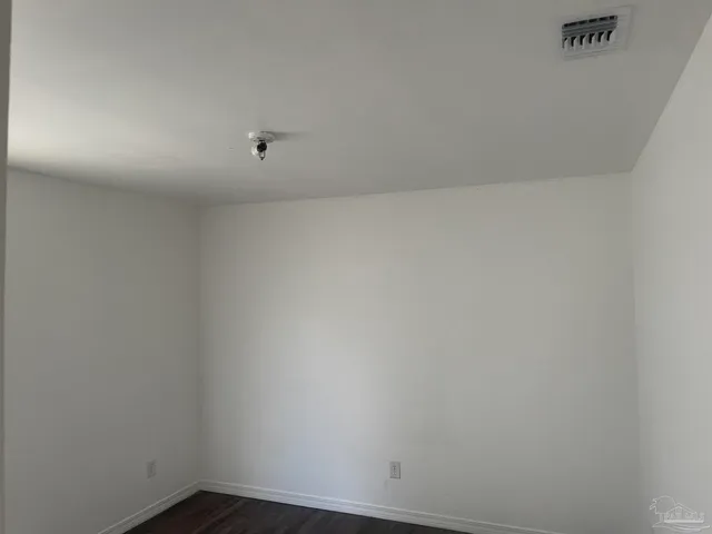 a view of small space with racks on the wall